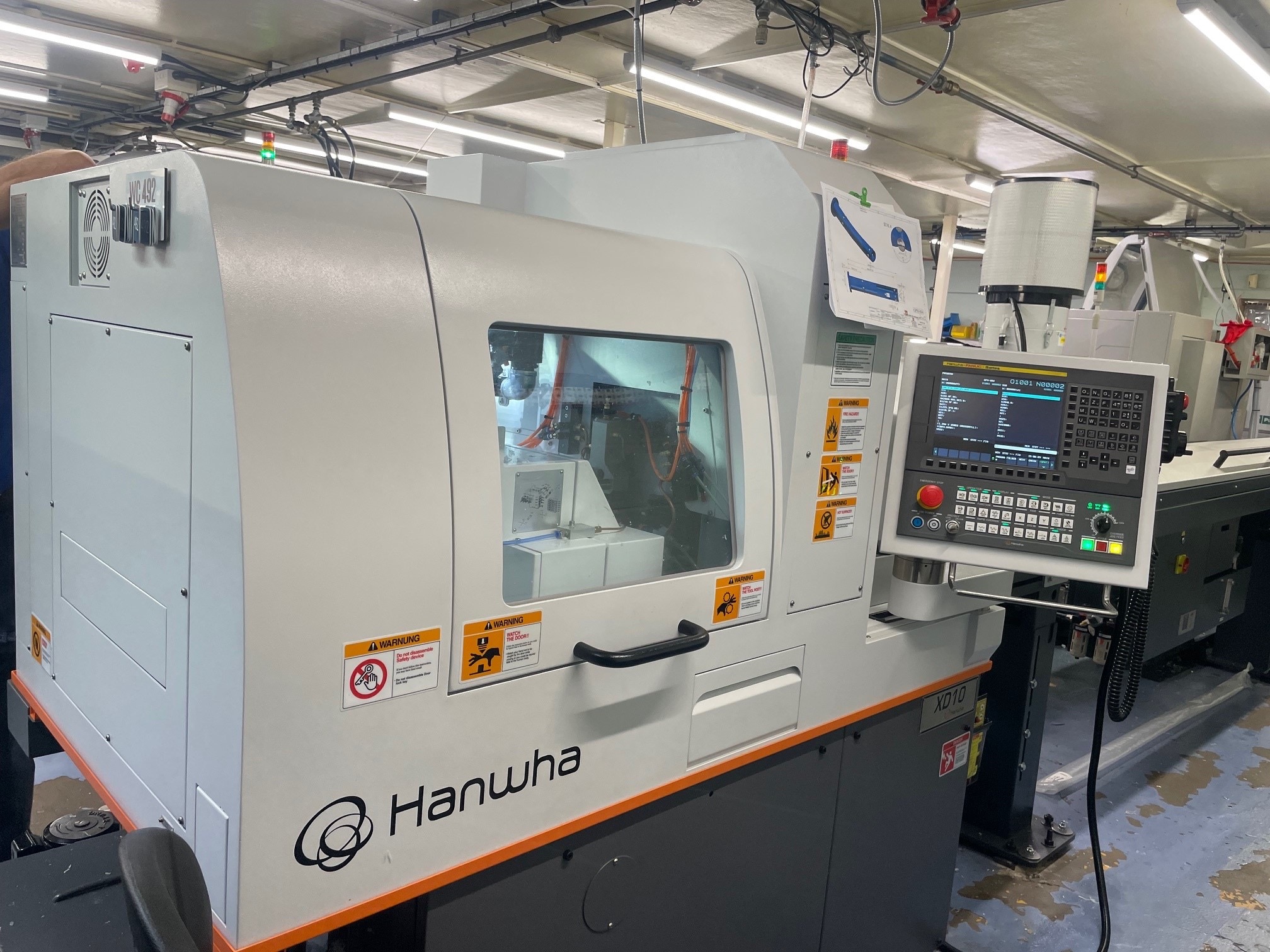 FOR SALE 2023 Hanwha XD 10-5 CNC Axes (12mm capacity) CNC Sliding Head with Fanuc Oi TF LNS Alpha 212 S3 Bar Loader 